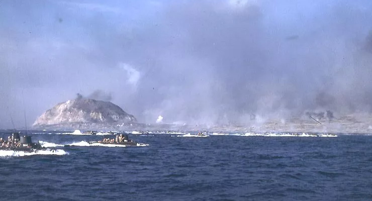 Amphibious tractors (LVT) head for landing beaches on Iwo Jima, circa February 19, 1945. U.S. Naval History & Heritage Command